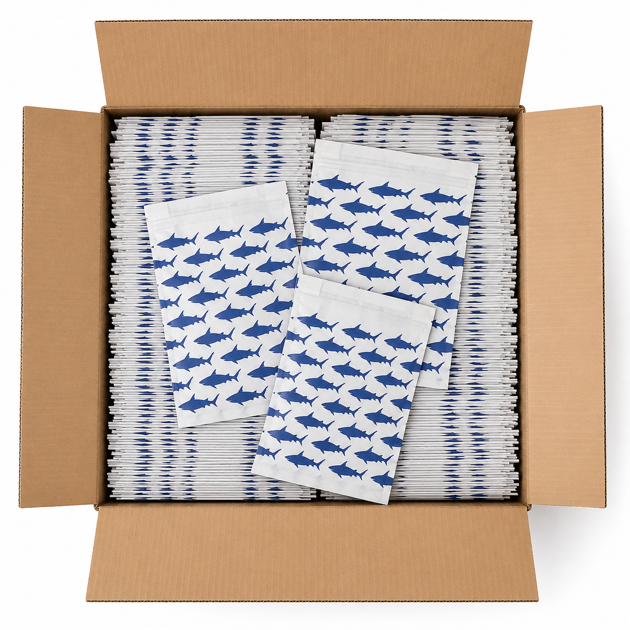 Image of Box of white paper towels with blue shark patterns on a white background