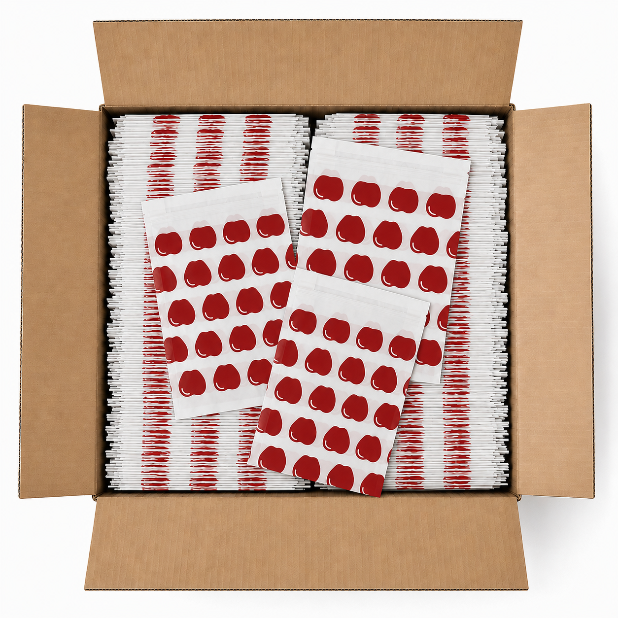 Image of Box filled with packages of white paper with red polka dots on a white background