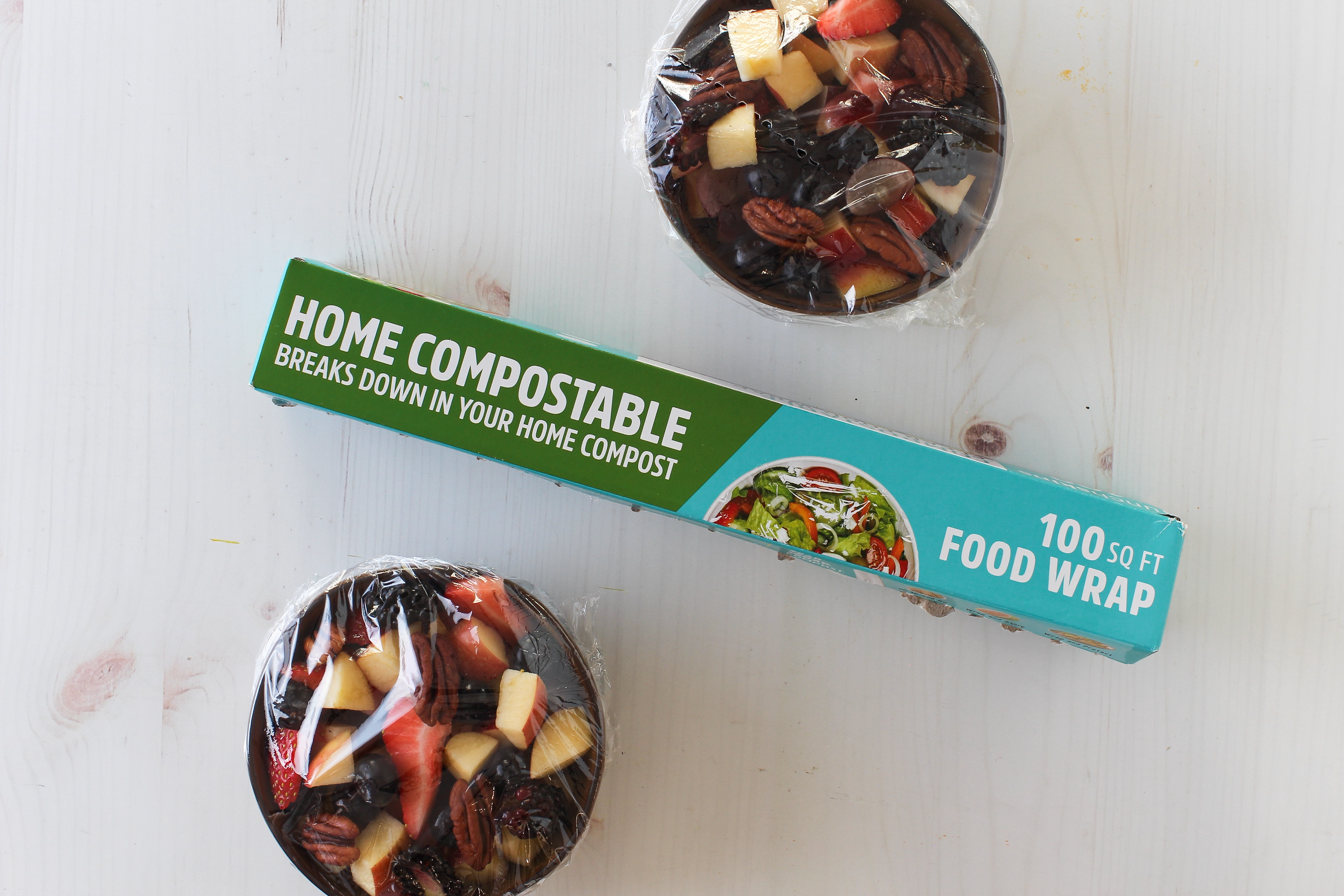 Image of Home compostable food wrap with two wrapped food items on a white surface